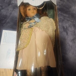 Vintage Seymour Mann Doll with Pink Dress and Blue Bow